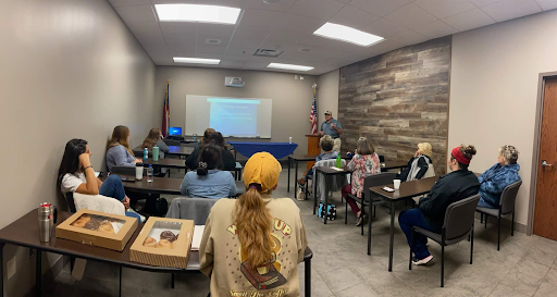 Professional handgun training session in Jefferson, GA, with a certified firearms instructor providing hands-on shooting guidance.